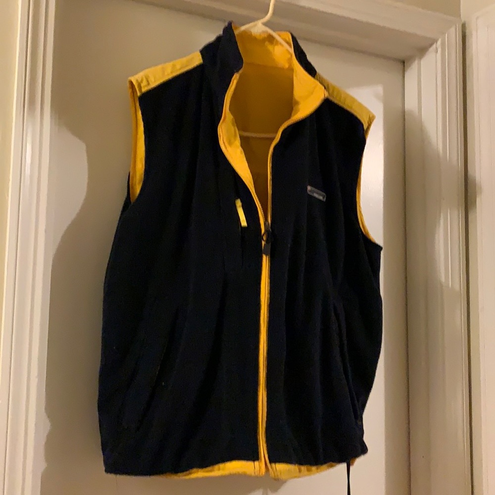 Men’s vest. Wear first 1 brand. Size M/L Great condition. Dark blue and yellow.